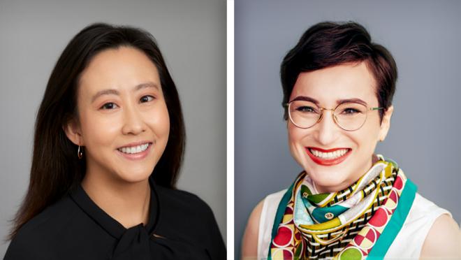 Image of two females smiling, one appears Asian and the other is White and wears glasses. 