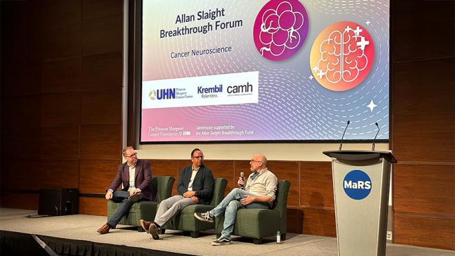 3 scientists talking at a panel discussion
