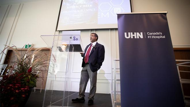 Photograph of Mahadeo Sukhai delivering the keynote presentation.