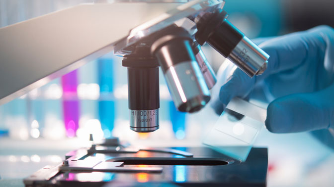 Pathologists play a key role in diagnosing cancers by using microscopes to examine miniscule characteristics of body tissues and samples.
