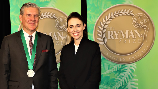 Dr. Fehlings (left), wearing the Ryman Prize commemorative medal, and New Zealand's Prime Minister Jacinda Ardern (right) photographed during the award ceremony in Auckland, New Zealand