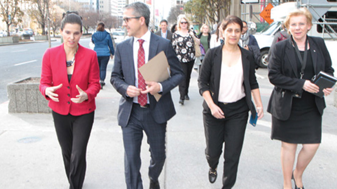 (L-R): The Honourable Kirsty Duncan, Canada's Minister of Science, tours the UHN campus with Dr. Brad Wouters, Dr. Rama Khokha and Dr. Mary Gospodarowicz.