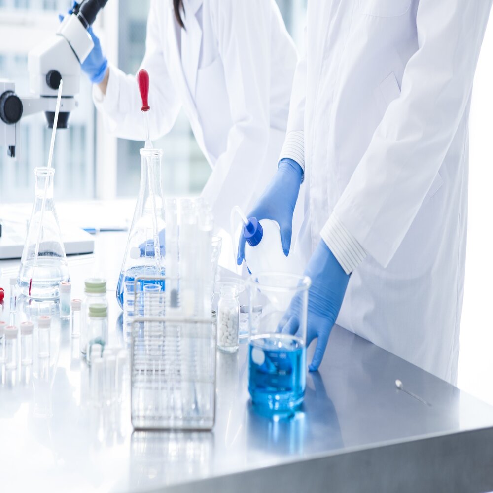 Scientists using equipment